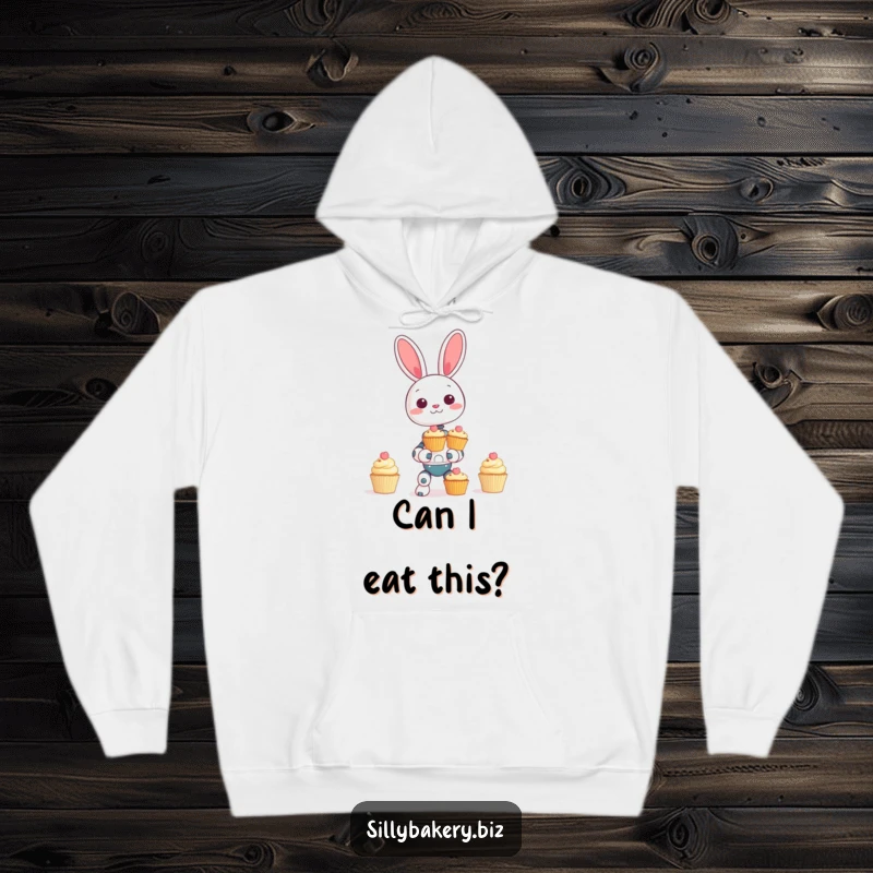 Funny bunny bot hoodie, cozy and cute, showing a giggling bot hilariously balancing a cupcake tower, perfect for sweet moments.