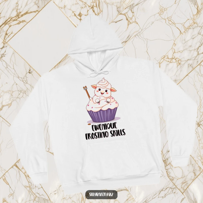 Funny sheep hoodie showing a fluffy cartoon sheep with its hoof, enthusiastically frosting a giant cupcake, a delightful baking scene.